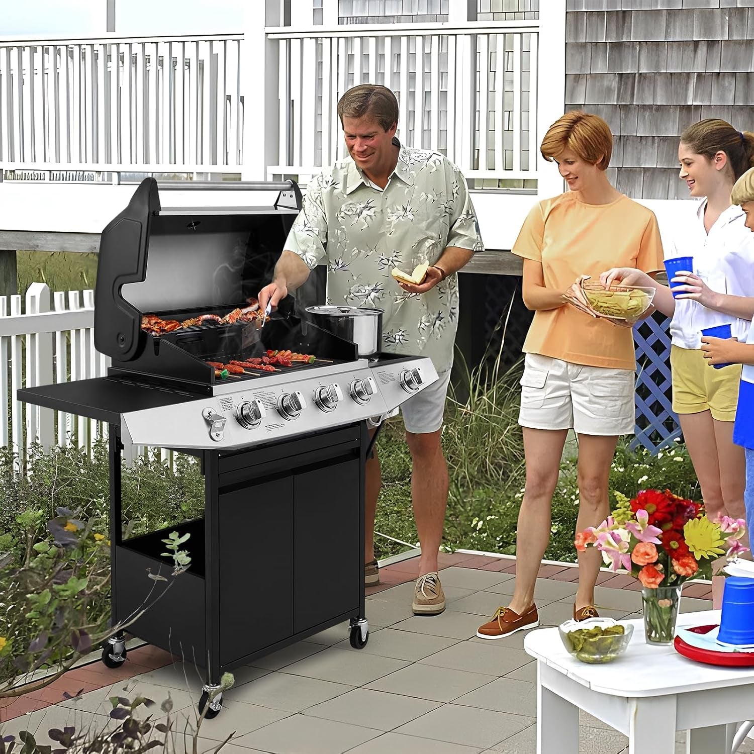 Propane Fueled Gas Grill With Four Burners Outdoor Kitchen